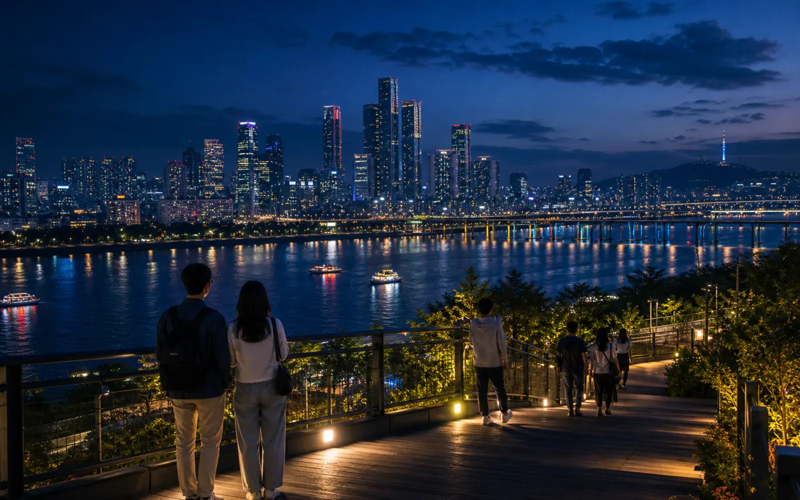 Seoul skyline at night seen from a calm overlook with city lights below